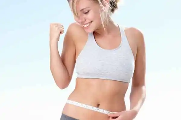 woman happy after fat reduction treatment Weston Super Mare